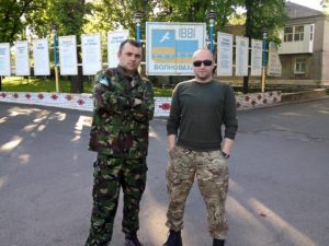 схі