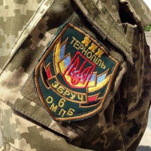 тн