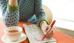 woman-tea-newspaper-628x363