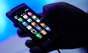 Hand holding smartphone