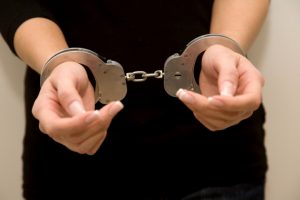 Woman_in_handcuffs_ajrwkk